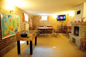 a room with a table and a board game at Noclegi Pod Orlikiem CENTRUM in Ustrzyki Dolne