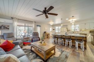 a living room with a couch and a table at Payson Summer Getaway w/ Backyard in Payson