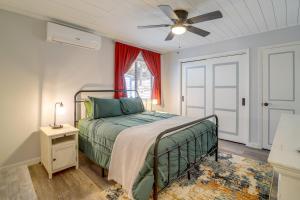 a bedroom with a bed and a ceiling fan at Payson Summer Getaway w/ Backyard in Payson