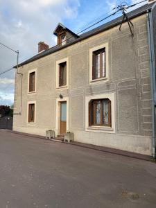 a white brick building on the side of a street at Comme en 40 in La Lande-sur-Drôme +7 photos
