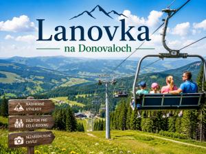 a group of people riding a ski lift in the mountains at Kamzík Apartment 64 Donovaly - hneď pri lanovke a atrakciách Donovalkovo, Fun arena - Apartment near the cable car and attractions in Donovaly