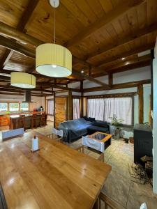 a living room with a couch and a table at Sierras de Canela premium in Tandil