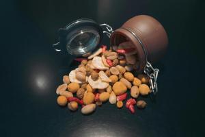a pile of food in a jar on a table at Storm Hotel by Keahotels in Reykjavík +23 photos