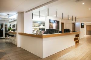 a bar in the lobby of a building at Storm Hotel by Keahotels in Reykjavík