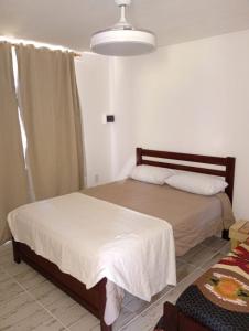 a bedroom with two beds in a room at Complejo ruka del pinar in San Ignacio