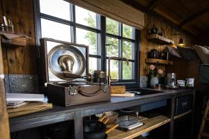 a kitchen counter with a sink and a window at The 450 from Paddington in Bourton on Dunsmore
