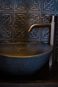 a blue sink in a bathroom with a wall at The 450 from Paddington in Bourton on Dunsmore +56 photos