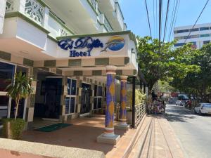 a building with a hotel sign on a street at Delfin Hotel Collection Rodadero in Rodadero +26 photos
