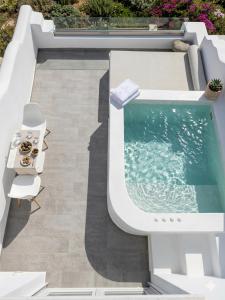 a swimming pool on the roof of a house at Martynou View in Pyrgos