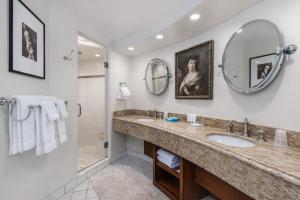 a bathroom with a large sink and a shower at Rosario Resort in Eastsound +63 photos