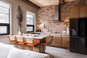 a kitchen with a table and chairs in a room at Pulaski Point Properties in Chicago
