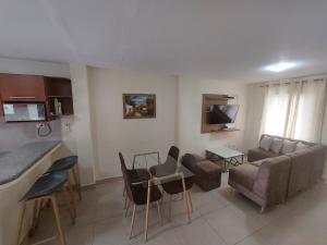 a living room with a couch and a table at Metrópolis Apartaments for Rent in Guayaquil