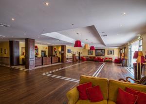 a living room with a bowling alley in a room at Vila Gale Ericeira in Ericeira