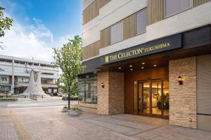 a building with a sign that reads i fire citation institution at The Celecton Fukushima in Fukushima
