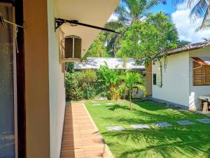 a view of a yard from the door of a house at Cantinho da Paz in Serra Grande