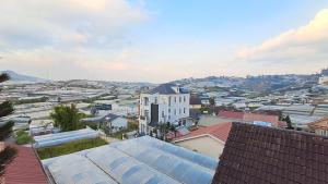 arial view of a city with a white building at Villa Aqua Da Lat in Da Lat