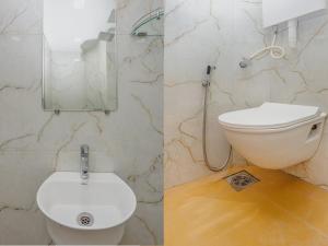 two pictures of a bathroom with a toilet and a mirror at Hotel Lexus7 in Mumbai +15 photos