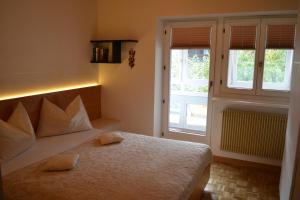 Posteľ alebo postele v izbe v ubytovaní Ferienwohnung Pramstaller