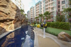 a rendering of a pool in a resort at Caribbean Hotel Resort Pattaya in Pattaya South