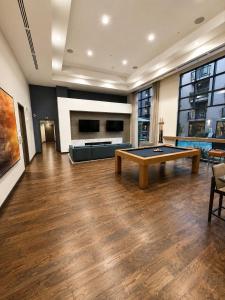 a large room with a pool table in it at Universal Stays Hollywood-Seconds to Universal Studios in Los Angeles