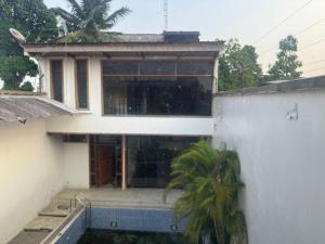 a house is being constructed with a building at Sonrisas in Iquitos