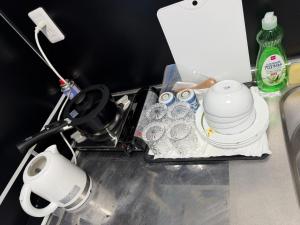 a counter top with a tea pot and dishes on it at 和風2西北口 in Tokyo +20 photos
