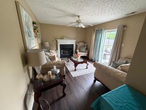 a living room with a couch and a table at Marvielous Stay in Jacksonville