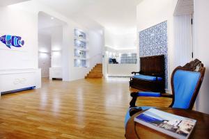Posezení v ubytování Aequa Hotel