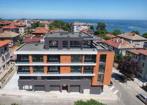 an aerial view of a building in a city at Апартамент Велкови in Tsarevo