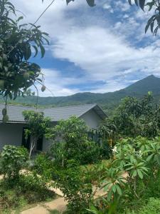 a house with a view of a mountain at Educational Eco Ba Vi in Thủ Pháp