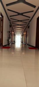 a hallway in a building with a ceiling at RS Green Barathi in Kilinochchi