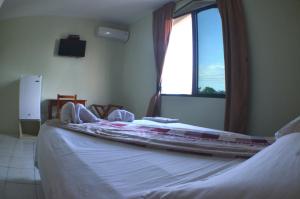 Voodi või voodid majutusasutuse Hostal Andry toas