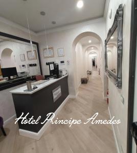 a room with a hotel entrance with a hotel mirror at Hotel PRINCIPE AMEDEO in Rome