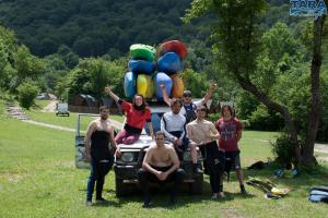 a group of people standing on the back of a truck at Rafting Center "TARA-RAFT" in Bastasi +125 photos