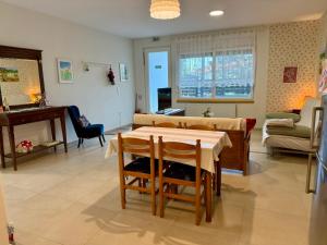a living room with a table and a couch at Elato apartment in Florina
