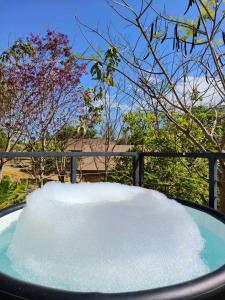 a pile of snow sitting on top of a table at The Playground in Baras