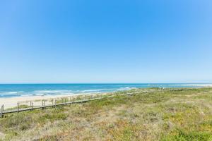 a view of the beach from a bluff at Aguda Beach Apartment in Arcozelo