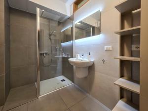 a bathroom with a shower and a toilet and a sink at B&B Color Rovereto in Rovereto +51 photos
