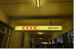 a sign for a bus stop in a building at The Ashford Hotel and Restaurant in Ashford
