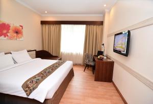 TV a/nebo společenská místnost v ubytování Angkasa Garden Hotel