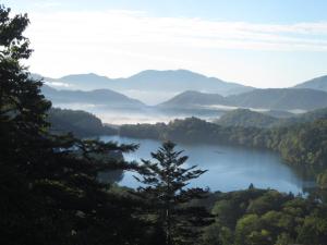 a view of a lake in the mountains at Shiunso in Nikko