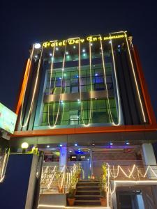 a large building with lights on it at night at Hotel Dev Inn in Dhangadhi