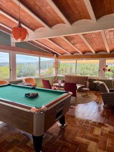 a billiard room with a pool table in a house at Hotel Cadaqués1962 by Fimedhotels in Cadaqués