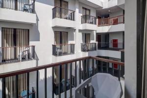 a view of the balconies of a building at Palette Hotel Seminyak in Seminyak