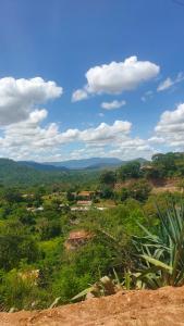 a view of a village from the top of a hill at Sere n' Lukundo Park & Camping Services in Voi