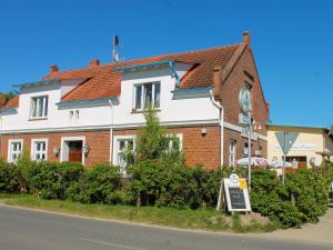 a house with a sign in front of it at Rankwitzer Hof in Rankwitz