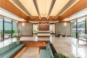 a lobby of a hospital with a waiting room at Latauli Sanctuary in Upardāng Garhi