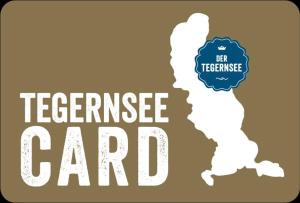 a sign that says teenager card with a map at Ferienwohnungen Kimpfbeck, Kreuth-Schärfen in Kreuth +16 photos