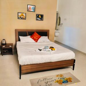 a bedroom with a bed with a truck on it at Tamil Megam Villa in Chennai