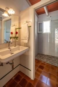 a bathroom with a sink and a shower at Can Miquel, villa in Pollensa in Pollença +27 photos